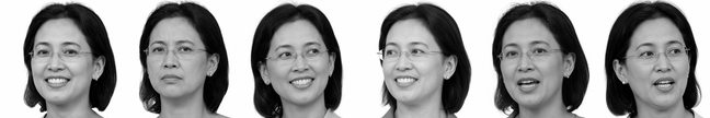 A smiling woman with glasses